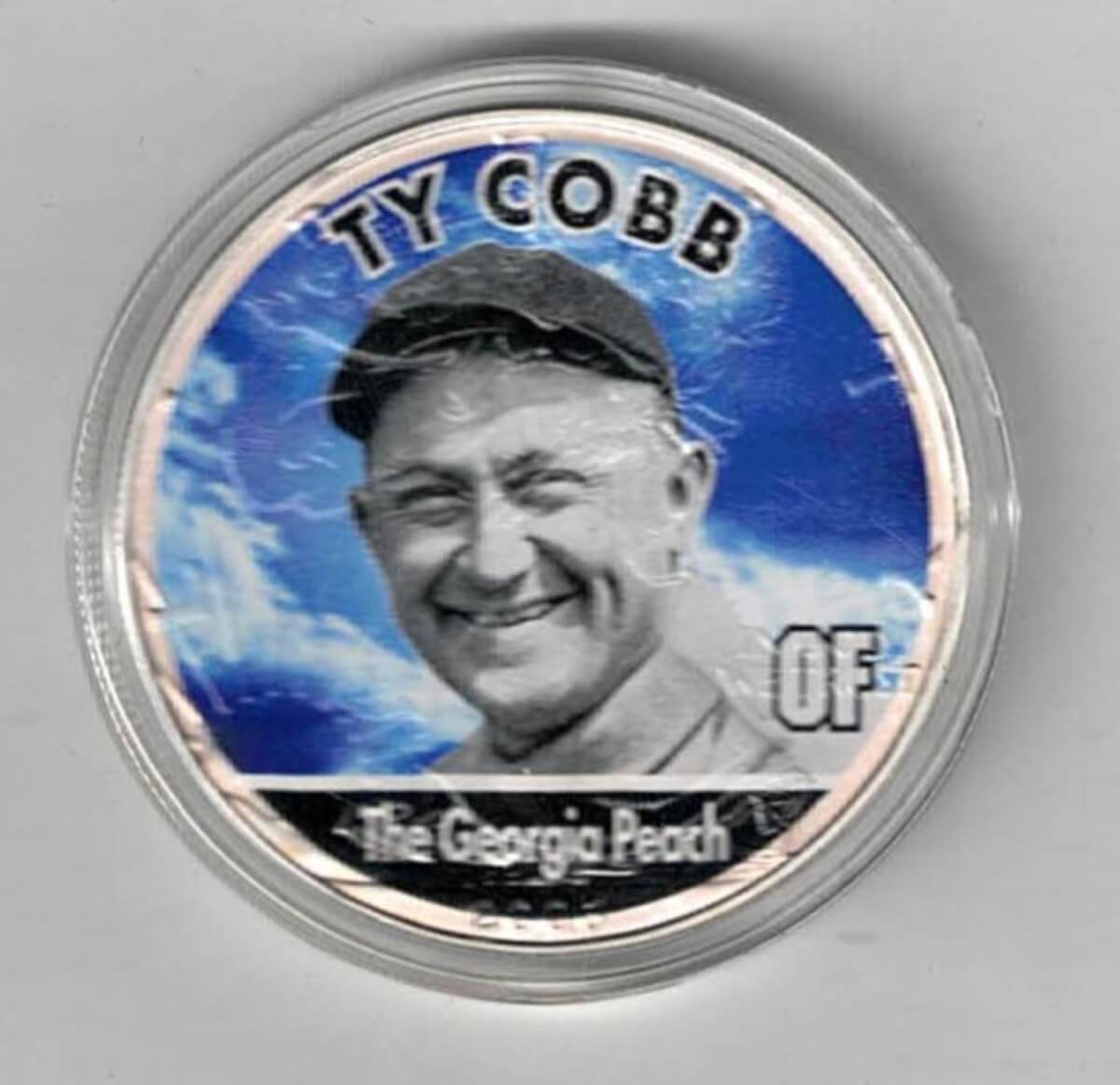 Boxed 2006 Silver USA One Ounce Eagle Colourised MLB Ty Cobb Coin. An eagle is on the reverse. The coin contains one ounce of 999 fine silver.