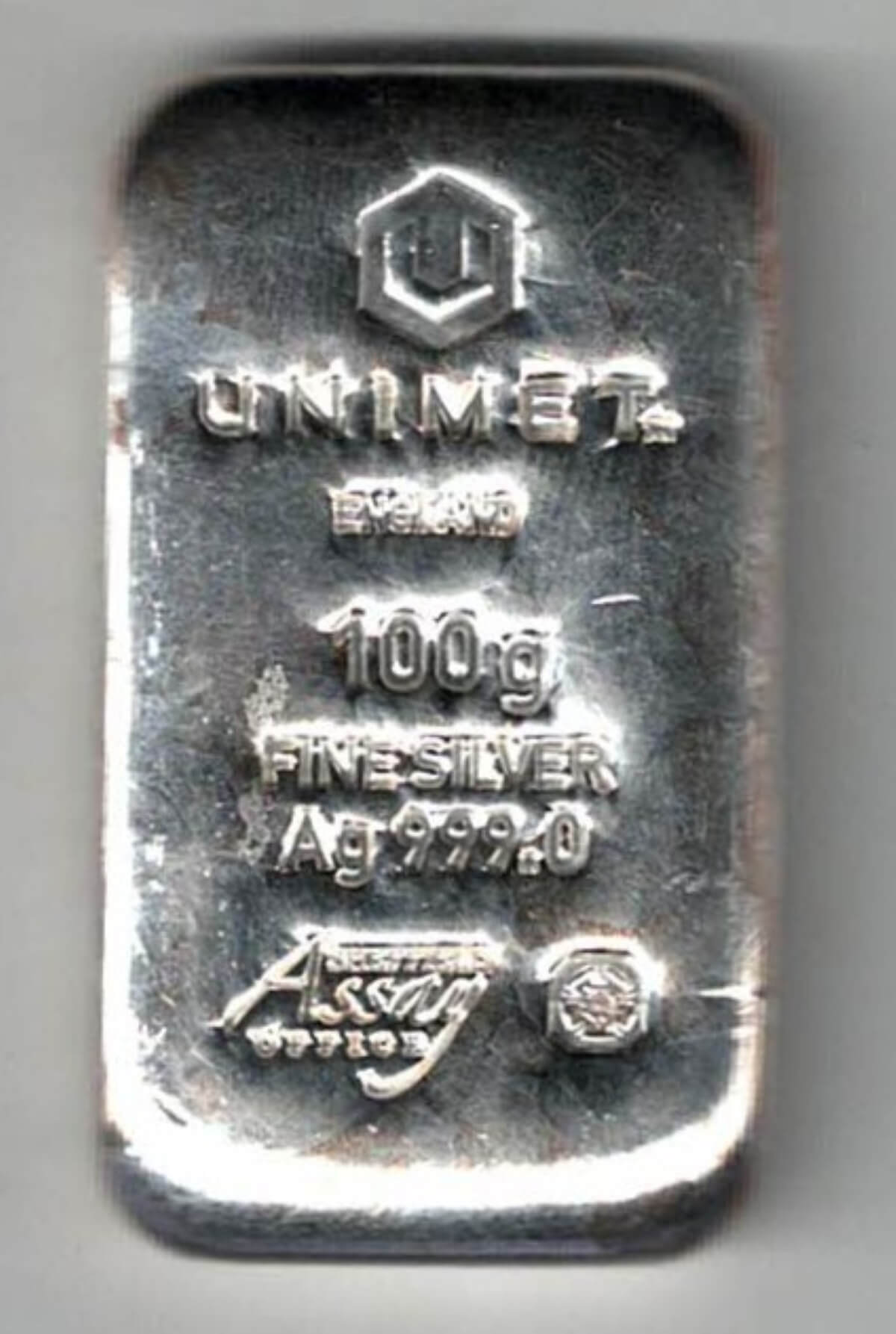 Unimet One Hundred Gram Silver Bar . All of our silver bars have been pre-owned and are in stock. You are buying the silver 100 gram bar in the pictures.