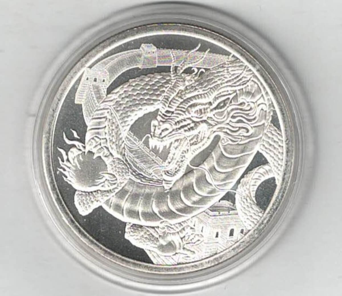 World Of Dragons Silver One Ounce Round . The round contains one ounce of .999 fine silver. All rounds/coins are in stock.