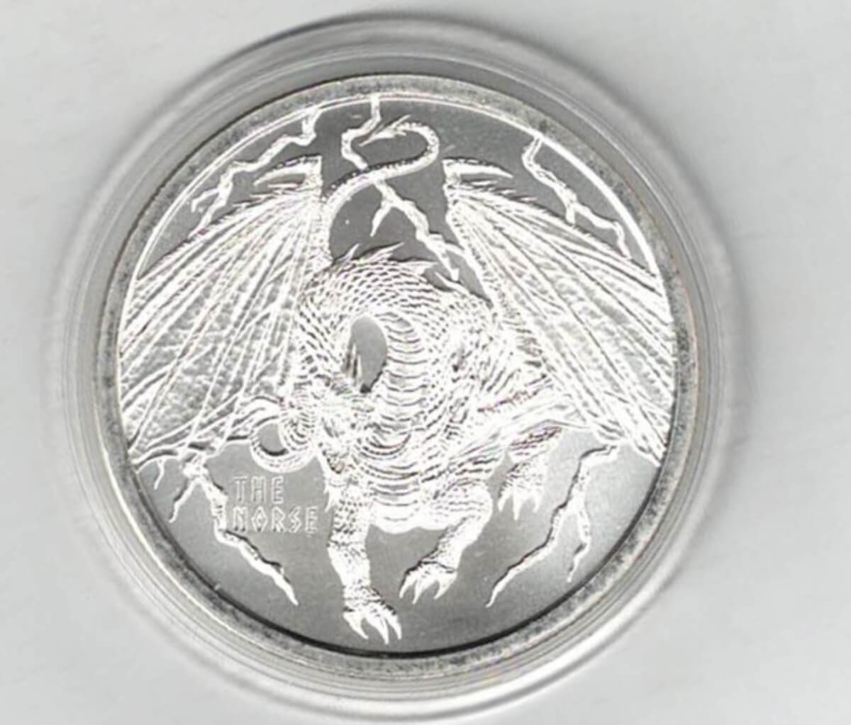 World Of Dragons Silver One Ounce Round . The round contains one ounce of .999 fine silver. All rounds/coins are in stock.