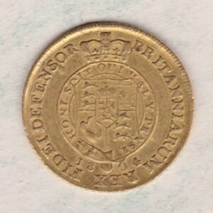 1804 Gold Half Guinea Coin featuring the laureate head portrait of King George III on the obverse. The reverse features the crowned shield of arms.